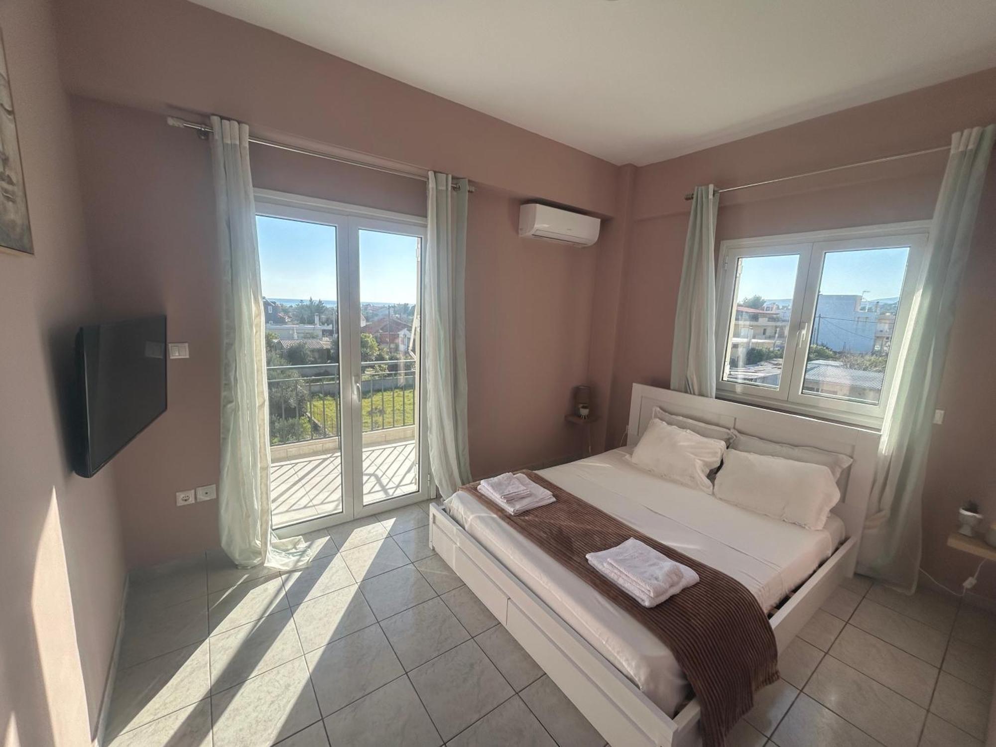 Aktis Apartment Near Airport Артемида Екстериор снимка